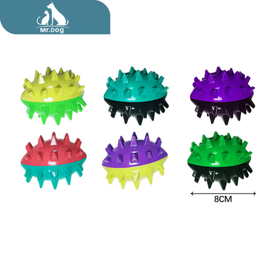 Juguete para mascota de rugby con pinchos de colores en azul, verde, morado, amarillo, negro y rojo paq. con 12 pzas